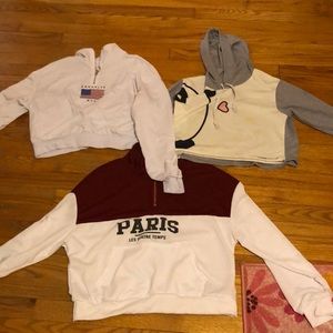 2 Quarters zip crops and one hood crop top